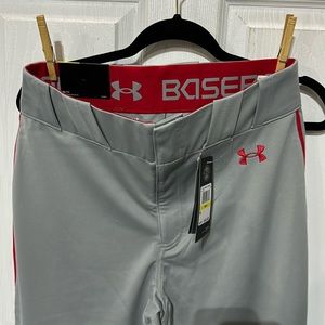Men’s medium Under Armour loose relaxed heat gear gray pants with red pin stripe